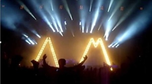 crowd in front of stage light show