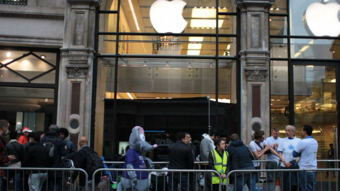 Squeak from Protect Your Bubble waits in line at the Apple store for the iPhone 5