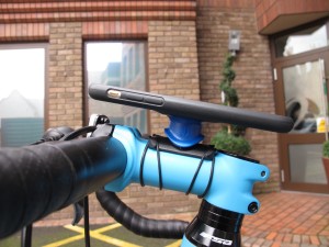 close up of Quadlock case on bicycle handlebars