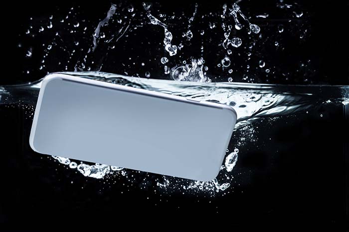 image of a mobile phone under water